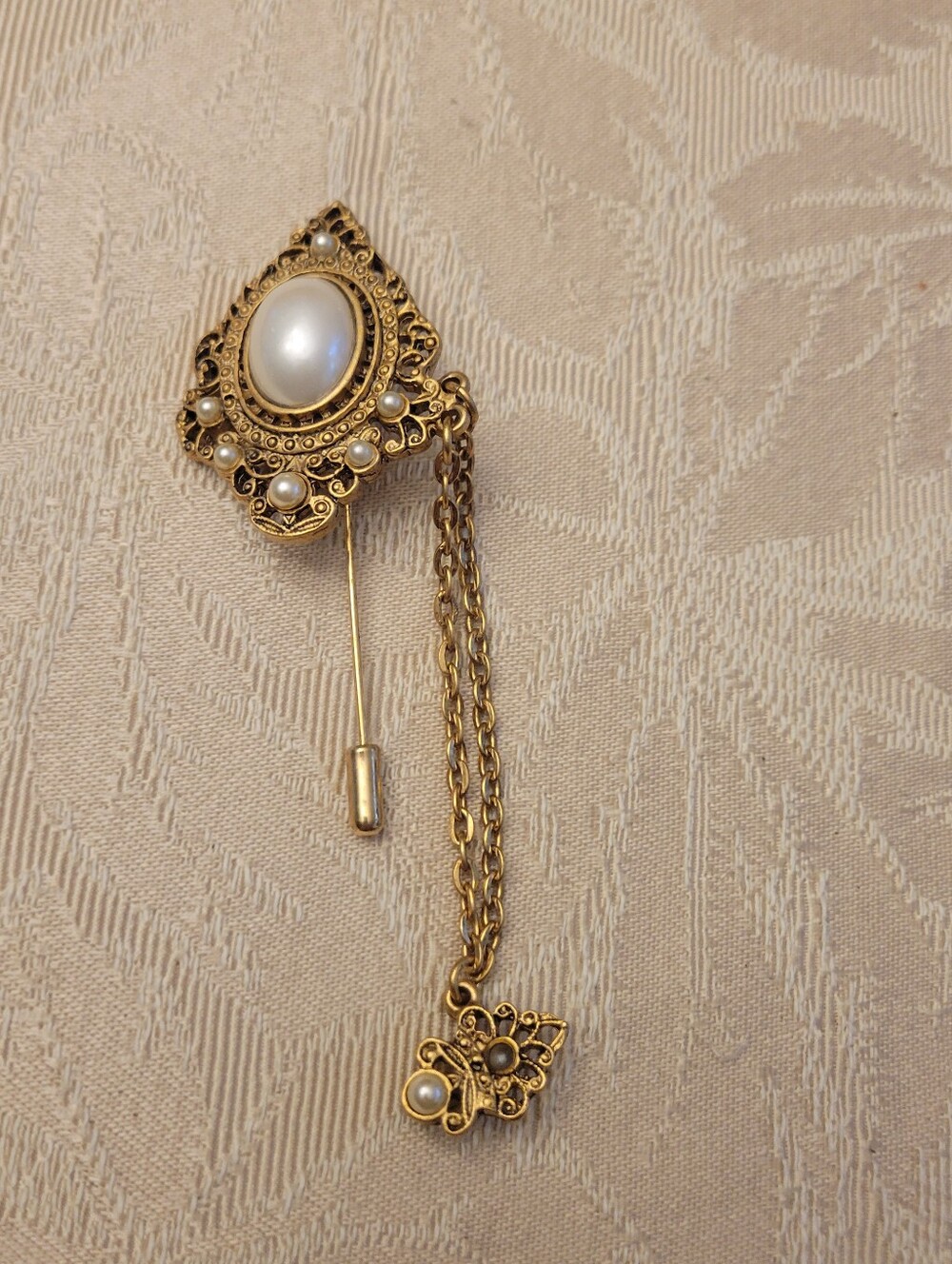 Victorian Style Gold Tone Filigree Brooch w/ Faux Pearl Dangle Chain